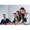Group of happy young  business people in a meeting at office