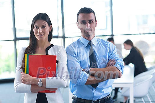 Group of happy young business people in a meeting at office Group of happy young business people in a meeting at office