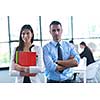 Group of happy young  business people in a meeting at office