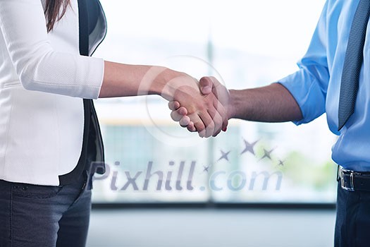 business people man and woman shake hands make deal and sign contract business people man and woman shake hands make deal and sign contract