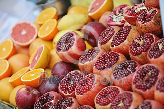Colorful display of fruits background on traditional local market ready to made fresh juice drink Colorful display of fruits background on traditional local market ready to made fresh juice drink