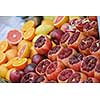 Colorful display of fruits background  on traditional local market ready to made fresh juice drink