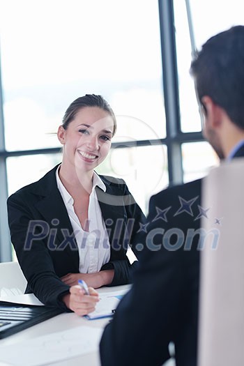 Group of happy young business people in a meeting at office Group of happy young business people in a meeting at office