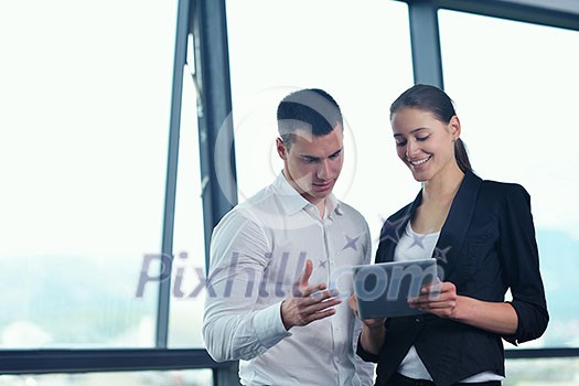 Group of happy young business people in a meeting at office Group of happy young business people in a meeting at office