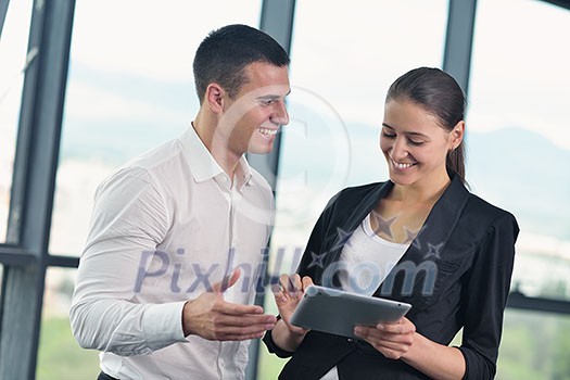 Group of happy young business people in a meeting at office Group of happy young business people in a meeting at office