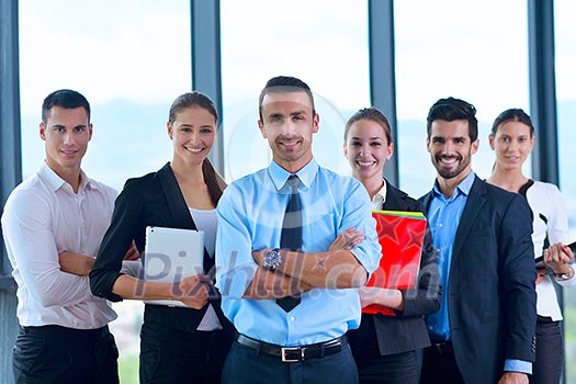 business people group joining hands and stay as team in circle and representing concept of friendship and teamwork business people group joining hands and stay as team in circle and representing concept of friendship and teamwork