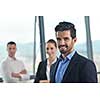 Group of happy young  business people in a meeting at office