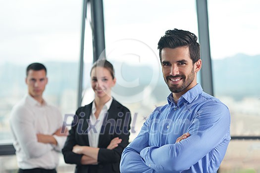 Group of happy young business people in a meeting at office Group of happy young business people in a meeting at office