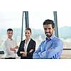 Group of happy young  business people in a meeting at office