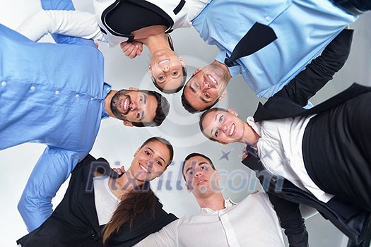 Group of happy young business people in a meeting at office Group of happy young business people in a meeting at office