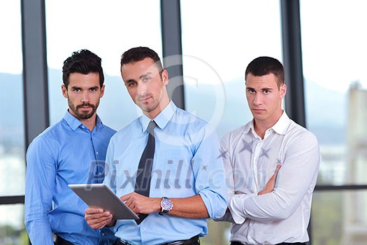 close-up of human hand  business man using tablet compuer at office