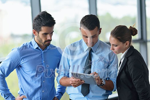 Group of happy young business people in a meeting at office Group of happy young business people in a meeting at office