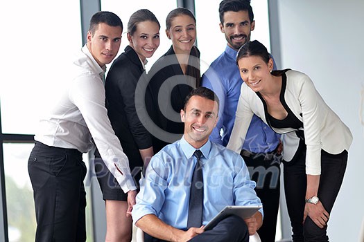 Group of happy young business people in a meeting at office Group of happy young business people in a meeting at office