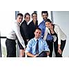 Group of happy young  business people in a meeting at office