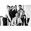 Group of happy young  business people in a meeting at office