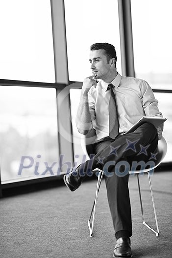 happy young business man work in modern office on computer happy young business man work in modern office on computer