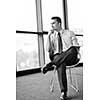 happy young business  man work in modern office on computer