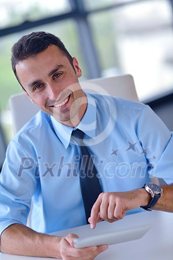 close-up of human hand business man using tablet compuer at office close-up of human hand business man using tablet compuer at office