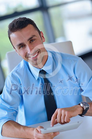 close-up of human hand business man using tablet compuer at office close-up of human hand business man using tablet compuer at office