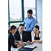Group of happy young  business people in a meeting at office