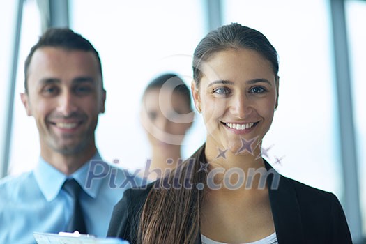 Group of happy young business people in a meeting at office Group of happy young business people in a meeting at office