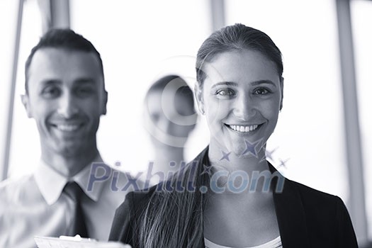 Group of happy young  business people in a meeting at office