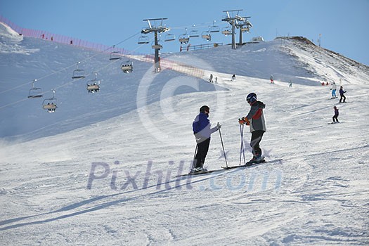 jumping skier at mountain winter snow fresh suny day jumping skier at mountain winter snow fresh suny day
