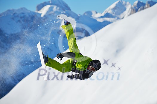 jumping skier at mountain winter snow fresh suny day jumping skier at mountain winter snow fresh suny day