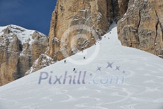 jumping skier at mountain winter snow fresh suny day jumping skier at mountain winter snow fresh suny day