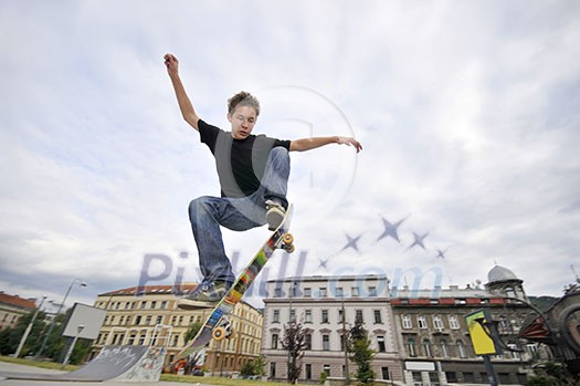 Boy practicing skate in a skate park Boy practicing skate in a skate park