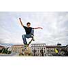 Boy practicing skate in a skate park 