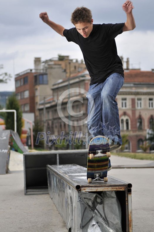 Boy practicing skate in a skate park Boy practicing skate in a skate park