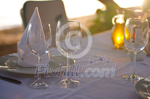 empty vine glasses at outdoor restaurant empty vine glasses at outdoor restaurant