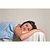 back massage at the spa and wellness center with beautiful brinette woman