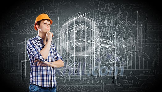 Image of thoughtful man builder with arms crossed on chest Image of thoughtful man builder with arms crossed on chest