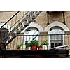 Fragment of a brick house in Boston historical North End,  metal fire escape