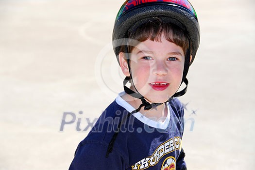 Portrait of a little boy rollerblading in a helmet Portrait of a little boy rollerblading in a helmet