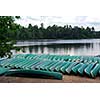 Canoes on lake shore in northern Ontario