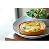 Quiche and caesar salad