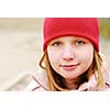 Portrait of a girl in a red hat