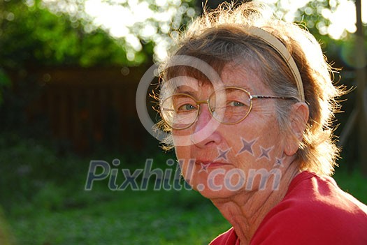 Portrait of a senior woman outside Portrait of a senior woman outside