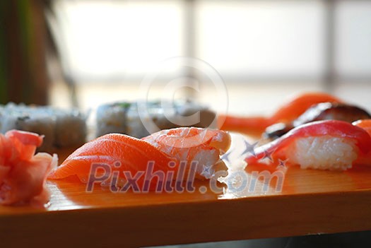 Sushi on a wooden board Sushi on a wooden board