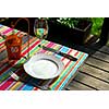 Table setting outside on a deck