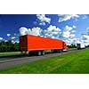 Bright red truck on road, blurred because of fast motion