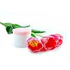 Pink tulips and cream on white background