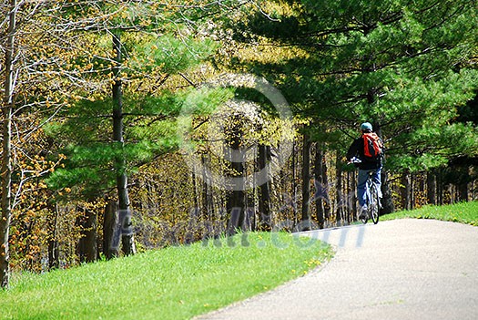 Man on bicycle on a trail Man on bicycle on a trail