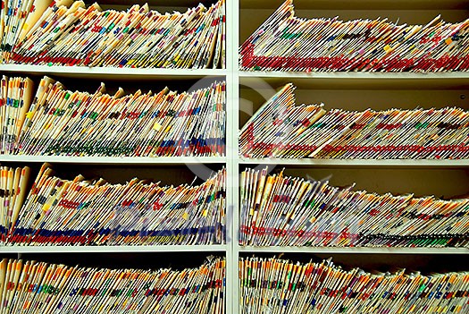 Medical files with patient information in doctor's office Medical files with patient information in doctor's office