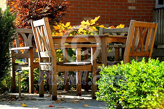 House patio with natural wooden patio furniture House patio with natural wooden patio furniture