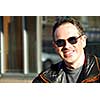 Smiling man in sunglasses