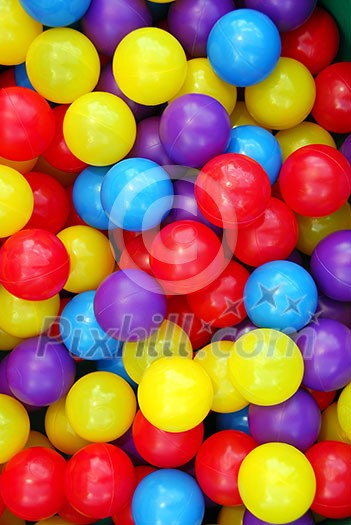 Background of colorful plastic balls at indoor playground Background of colorful plastic balls at indoor playground